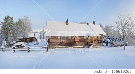 A small log cabin, wooden temple is covered in snow. 136619263