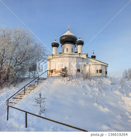 A large white church with a steeple, wintertime. A large white church with a steeple, wintertime. 136619264