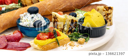 snack platter with bread, dips appetizer banner snack platter with bread, dips appetizer banner 136621397