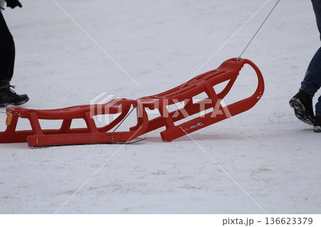 Person pulling sled. High quality photo Person pulling sled. High quality photo 136623379