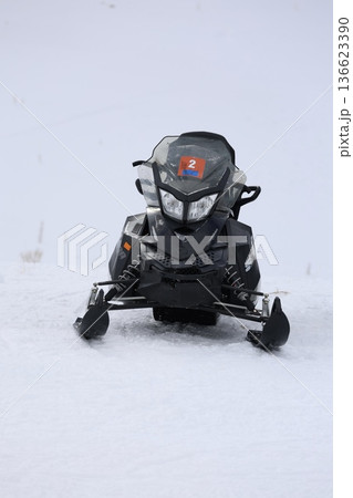 Snowmobiles winter landscape Snowy snowmobile solitude. High quality photo 136623390