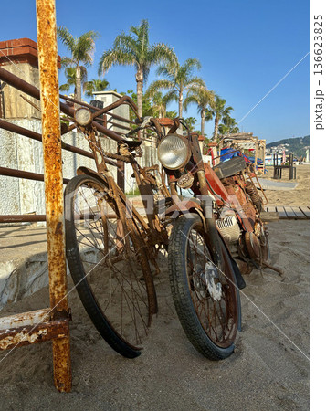 Rusty beach motorcycle. High quality photo 136623825