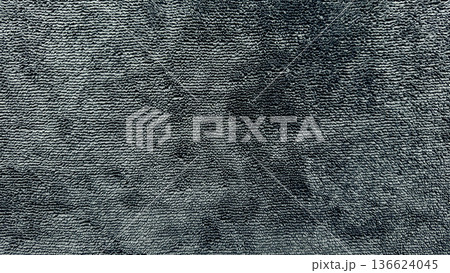 abstract dark gray fabric texture with wavy patterns and soft depth for minimalist wallpaper or versatile banner background 136624045