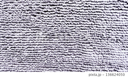 lavender terrycloth texture macro closeup with soft looped fibers abstract pattern for spa wallpaper or cosmetic banner background lavender terrycloth texture macro closeup with soft looped fibers abstract pattern for spa wallpaper or cosmetic banner background 136624050