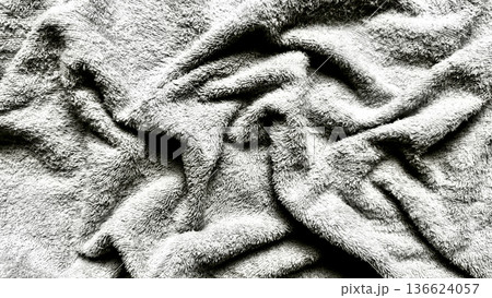 monochrome fluffy towel twists in abstract closeup evoking serene comfort ideal for wallpaper backdrop or editorial texture illustration monochrome fluffy towel twists in abstract closeup evoking serene comfort ideal for wallpaper backdrop or editorial texture illustration 136624057