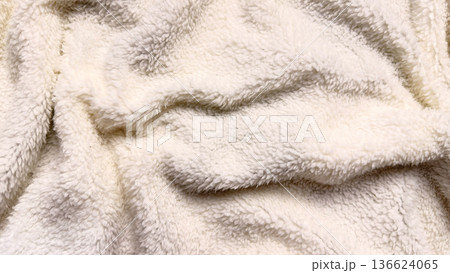 creamy white fluffy sherpa fleece texture with soft folds and waves for cozy winter wallpaper or banner background 136624065