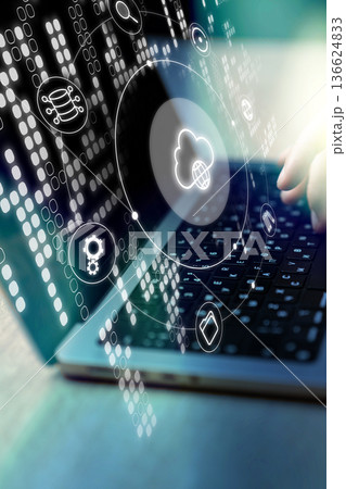 Data management and cloud computing in a busy work environment with a laptop 136624833