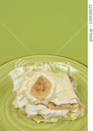 Banana cream cake with meringue layers 136626075