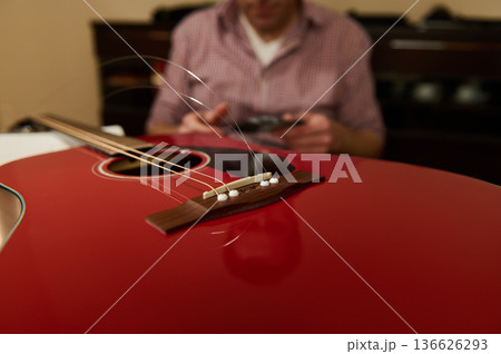 Master Adjusting And Changing Guitar Strings - Guitar Maintenance And Repair Concept 136626293