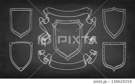 Hand-drawn heraldic shields with ribbons 136629358