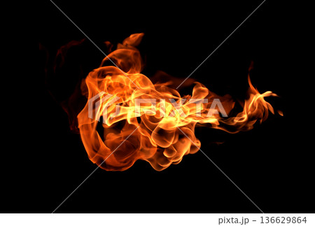 Fire flames on a black background abstract. Fire flames on a black background abstract. 136629864