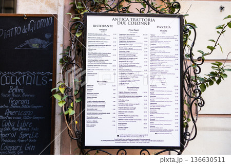 Italian restaurant menu board mounted on wall in Rome Italian restaurant menu board mounted on wall in Rome 136630511