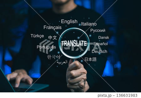 Translation and Multilingual Communication Concept. A magnifying glass highlights the word "Translate," surrounded by names of multiple languages, multilingual translation, and global communication. 136631983