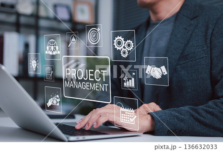 Project management technology concept. Businessman working on laptop with icons representing planning, task tracking, team collaboration, deadline, optimization, goal setting and workflow automation. 136632033