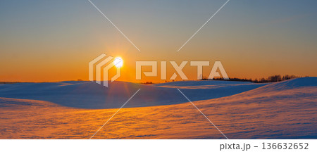 Winter landscape in the evening light Winter landscape in the evening light 136632652