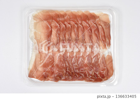 Sliced prosciutto ham in plastic tray packaging 136633405