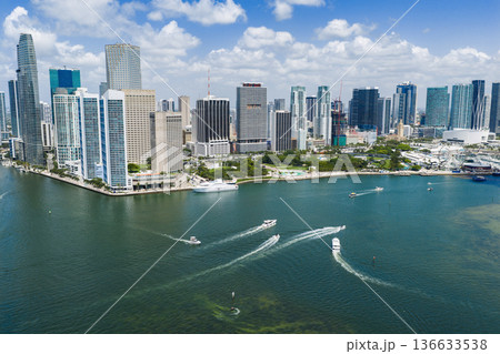 Aerial view of Brickell skyscrapers. Modern cityscape of downtown Miami. Panoramic Miamis skyline above the coastline. Brickell Key aerial view in Miami. Landscape of Miami. Miami Beach and Brickell. 136633538
