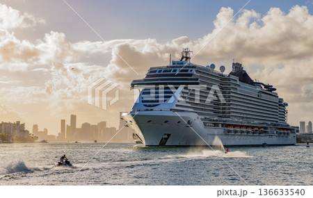 Cruise ship vacation. Majestic cruise ship in vacation summer. Cruise ship vacation and travel at sea. View of luxury liner. Ship leaving Miami beach port. Luxury sea vacation 136633540