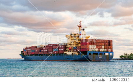 Miami, Florida, USA - November 25, 2024: Freight container on cargo vessel. Cargo ship vessel. Container ship. Cargo Annie B Monrovia ship services with container leaving port, drone view Miami, Florida, USA - November 25, 2024: Freight container on cargo vessel. Cargo ship vessel. Container ship. Cargo Annie B Monrovia ship services with container leaving port, drone view 136633554