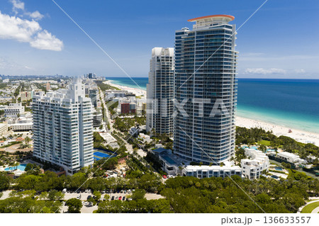Miami Beach. Skyline aerial view. Miami city. Tropical coastal Miami scene. Miami district sky view. Famous oceanfront. Panoramic coastline. South beach panorama view. Miami Beach. Skyline aerial view. Miami city. Tropical coastal Miami scene. Miami district sky view. Famous oceanfront. Panoramic coastline. South beach panorama view. 136633557