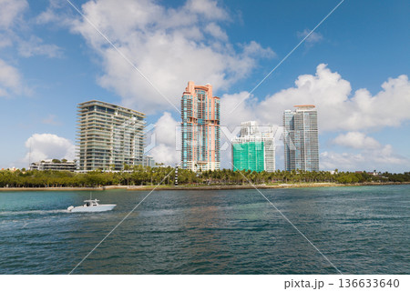 Yacht cruising near Miami Beach. Aerial view of boats on turquoise waters in Miami. Yacht retreat in South Florida Miami. Yacht cruising near Miami Beach. Aerial view of boats on turquoise waters in Miami. Yacht retreat in South Florida Miami. 136633640