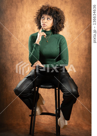 Thoughtful woman studio Thoughtful woman studio 136634636