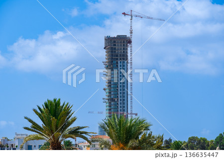 High-rise tower under construction on the Limassol seafront, Cyprus. High-rise tower under construction on the Limassol seafront, Cyprus. 136635447