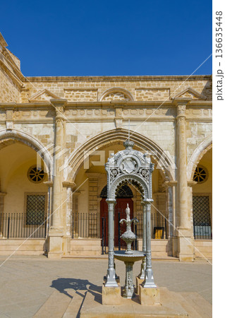 Ornate cast-iron memorial before Saint Joseph Maronite Church in Larnaca, Cyprus Ornate cast-iron memorial before Saint Joseph Maronite Church in Larnaca, Cyprus 136635448