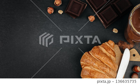 Chocolate croissant banner with dark copy space 136635735