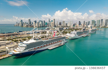 Miami, Florida, USA - March 31, 2025: Carnival Sunrise and MSC Divina cruise ship voyage. Cruise in summer vacation. Carnival cruise line. Cruise ship tour. MSC cruises. Ship in Miami port Miami, Florida, USA - March 31, 2025: Carnival Sunrise and MSC Divina cruise ship voyage. Cruise in summer vacation. Carnival cruise line. Cruise ship tour. MSC cruises. Ship in Miami port 136636437