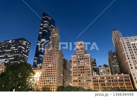Cityscape night with skyscraper building. Skyline architecture. Chicago city illuminated building. Night in Chicago city downtown. Skyscraper architecture. Chicago city cityscape. Bustling nightlife Cityscape night with skyscraper building. Skyline architecture. Chicago city illuminated building. Night in Chicago city downtown. Skyscraper architecture. Chicago city cityscape. Bustling nightlife 136636498