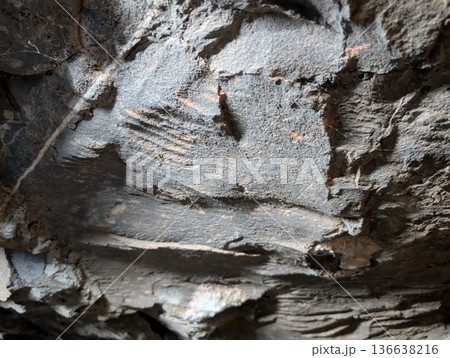 Close-up of marks in a basalt wall after tunnel boring at the Wanda mines in Misiones Province, Argentina. Close-up of marks in a basalt wall after tunnel boring at the Wanda mines in Misiones Province, Argentina. 136638216