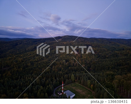 Quiet Evening Landscape, Tranquil Wooded Hilltop At Dusk Featuring Lone Cottage And Meandering Road Scene Quiet Evening Landscape, Tranquil Wooded Hilltop At Dusk Featuring Lone Cottage And Meandering Road Scene 136638431