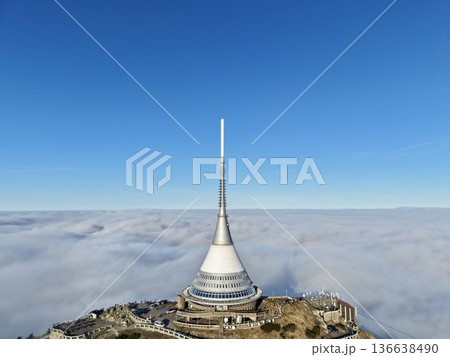 Simple Urban Monument, Architectural Silhouette Under Sky, Contemporary Tower Amid Misty Atmosphere Simple Urban Monument, Architectural Silhouette Under Sky, Contemporary Tower Amid Misty Atmosphere 136638490