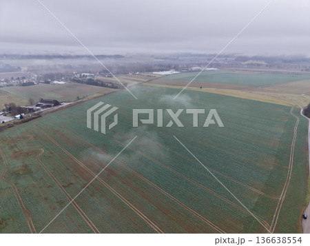 Drone Crop Survey, Field Examination From Above, Aerial View Of Farmland With Overcast Sky And Survey Lines Drone Crop Survey, Field Examination From Above, Aerial View Of Farmland With Overcast Sky And Survey Lines 136638554