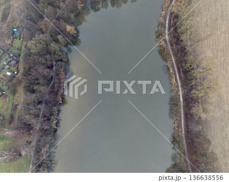 Calm Nature Scene With Water, Quiet Pastoral Landscape Showcasing Waters And Lush Farmland Around Calm Nature Scene With Water, Quiet Pastoral Landscape Showcasing Waters And Lush Farmland Around 136638556