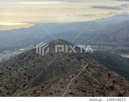 Winding Path Leads To Mountain Outlook, Secluded Trail Offers Breathtaking Scenes Of Ocean And Peaks 136638637