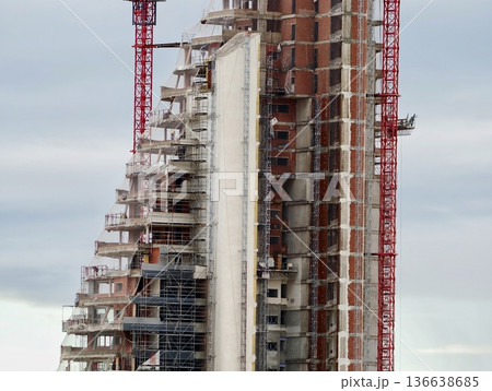 Skyscraper Being Built Overhead, Highrise Development With Cranes And Structural Frameworks Visible Skyscraper Being Built Overhead, Highrise Development With Cranes And Structural Frameworks Visible 136638685