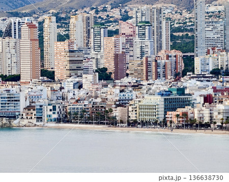 Bustling Shoreline With Mountain Backdrop, Expansive City Horizon Featuring Dense Housing And Ocean Views Bustling Shoreline With Mountain Backdrop, Expansive City Horizon Featuring Dense Housing And Ocean Views 136638730