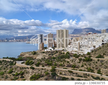 Seaside Cityscape Viewpoint, Vibrant Seaside Skyline Featuring Highrise Buildings And Mountain Backdrop Seaside Cityscape Viewpoint, Vibrant Seaside Skyline Featuring Highrise Buildings And Mountain Backdrop 136638735
