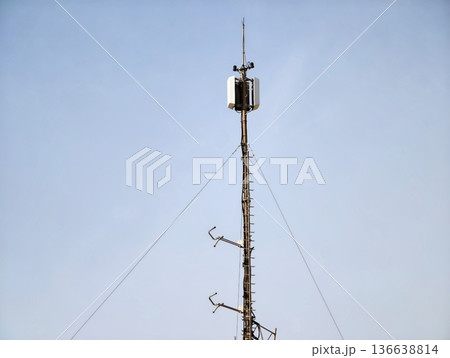 Metal Communication Tower With Antennas Supporting Remote Monitoring In Clear Sky Environment Metal Communication Tower With Antennas Supporting Remote Monitoring In Clear Sky Environment 136638814