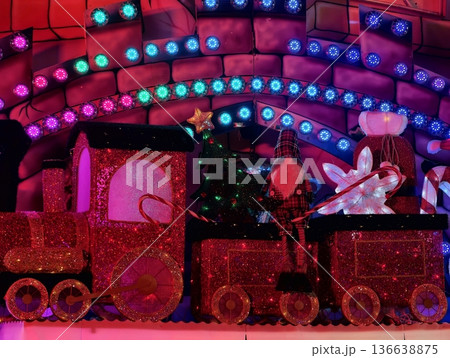 Festive Train Display, Holiday Train With Decorations, Whimsical Train Scene With Lights And Flowers Festive Train Display, Holiday Train With Decorations, Whimsical Train Scene With Lights And Flowers 136638875