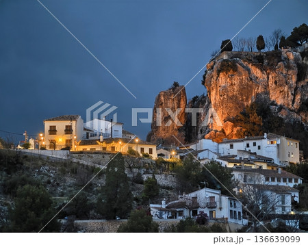 Nighttime Seaside Retreat, Picturesque Hillside Hamlet Illuminated By Warm Lights And Cobbled Pathways Nighttime Seaside Retreat, Picturesque Hillside Hamlet Illuminated By Warm Lights And Cobbled Pathways 136639099