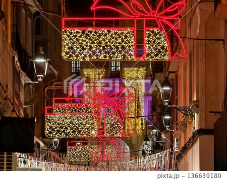 Nighttime Cityscape With Festive Decorations, Vibrant Urban Street Glowing With Seasonal Lights Nighttime Cityscape With Festive Decorations, Vibrant Urban Street Glowing With Seasonal Lights 136639180