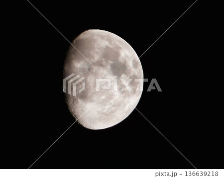Lunar Night Spectacle, Ethereal Gibbous Moon Reflects Dramatic Shadowing Beneath Dark Celestial Canopy Lunar Night Spectacle, Ethereal Gibbous Moon Reflects Dramatic Shadowing Beneath Dark Celestial Canopy 136639218