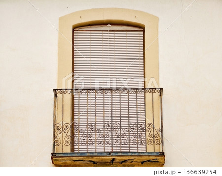 Tranquil Terrace With Old Walls, Quiet Balcony Adorned With Rusted Iron Railing And Chipped Paint 136639254