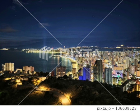 Sunset Blending Into Vibrant Coastal Nightlife, Serene Transition From Day To Night At Harbor Shore Sunset Blending Into Vibrant Coastal Nightlife, Serene Transition From Day To Night At Harbor Shore 136639525
