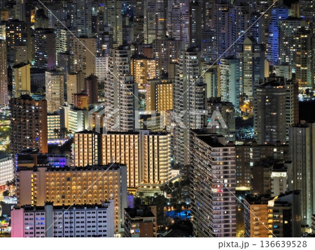 Vivid Urban Night Scene, Photograph Of Bustling City Skyline With Neon Lights And Tall Buildings 136639528
