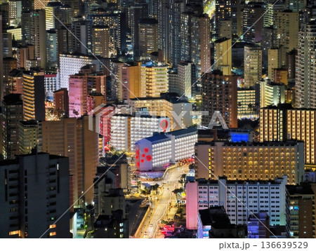 Night Street With Lively Illumination, Vivid City Night Scene With Glowing Lights And Bustling Activity 136639529