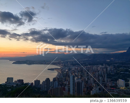 Coastal Sunset Scene, Serene Harbor View During Dusk, Peaceful Seaside Horizon With Clouds And Sunset Glow Coastal Sunset Scene, Serene Harbor View During Dusk, Peaceful Seaside Horizon With Clouds And Sunset Glow 136639559